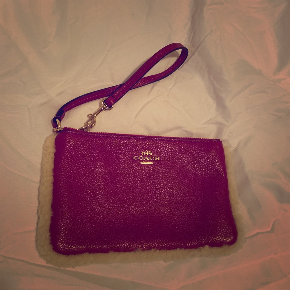 Pink fur coach wristlet - never used
